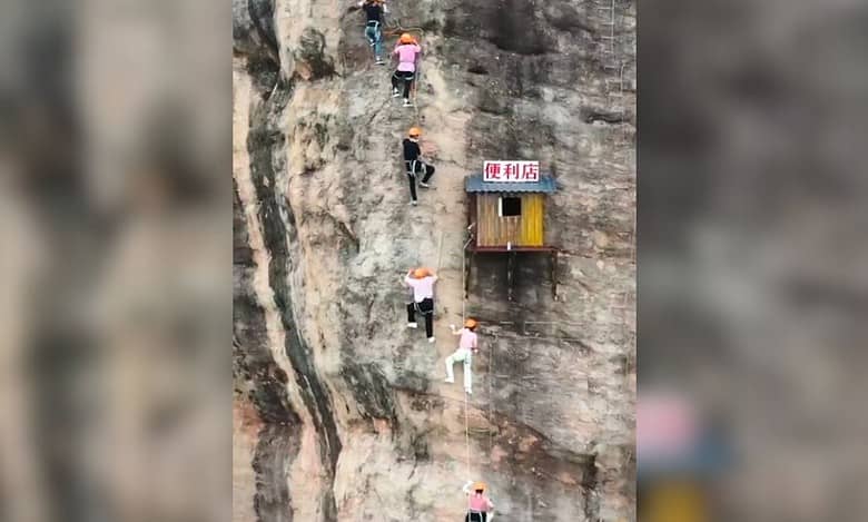 Watch: Convenience store hangs on cliff side at 393 feet in China