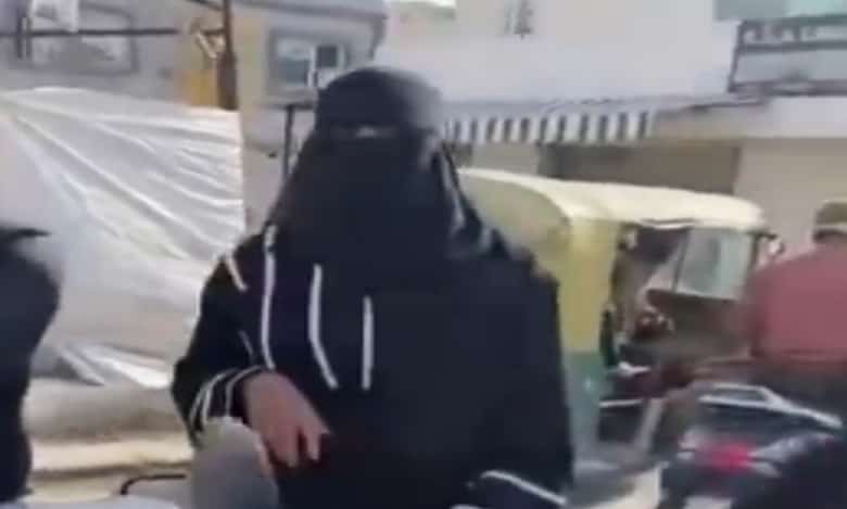 Appreciation pours in for burqa-clad Bengaluru woman bravely facing moral policing