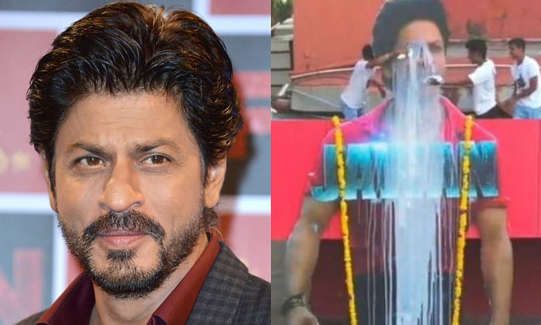 Fans pour milk on SRK's poster, King Khan reacts