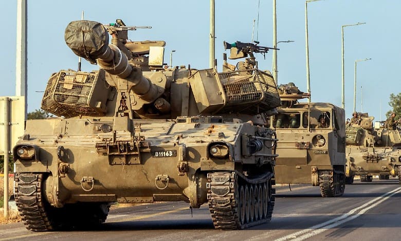 Israel moves hundreds of tanks close to Gaza fence as ground invasion looms