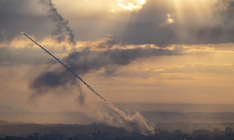 Hamas rockets injure three in Israel; Israeli forces strike central Gaza