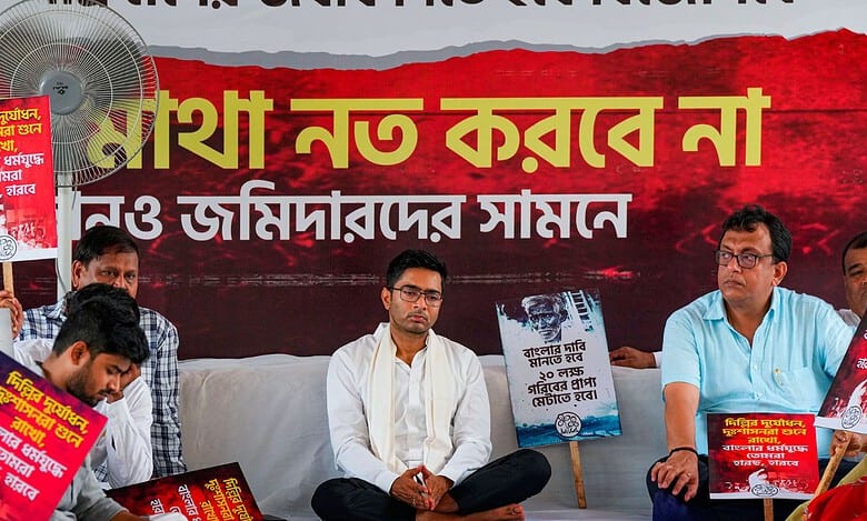 TMC general secretary Abhishek Banerjee sits on a 'dharna'