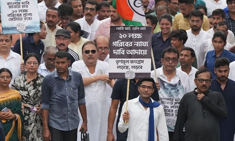 TMC general secretary Abhishek Banerjee with party activists during protest march towards West Bengal Governor house, in Kolkata