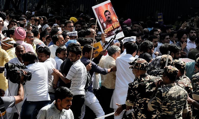 Sanjay Singh’s arrest: AAP workers try to break through police barricades