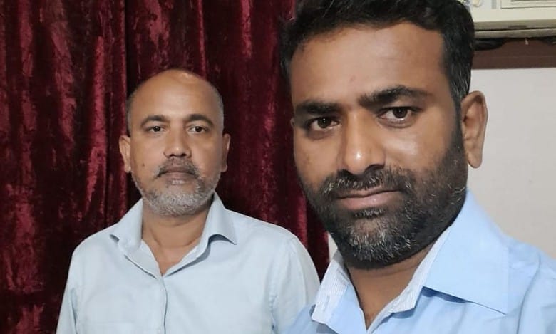Kondadam Krishna (right), Khursheed Ahmed (left)