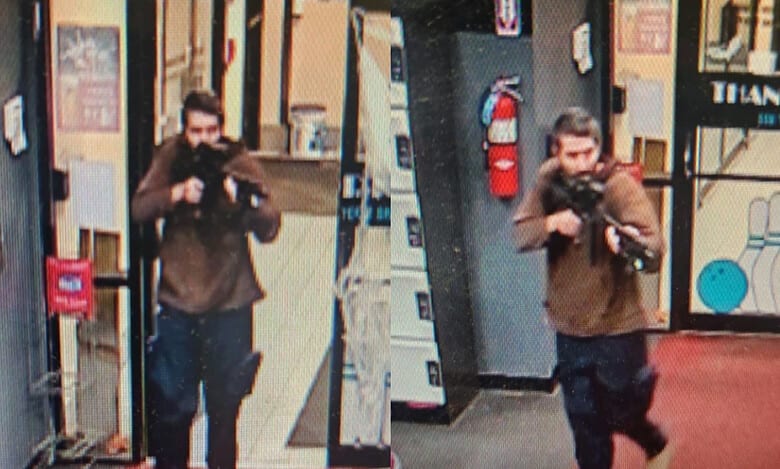 Massive manhunt underway in US state after mass shootings leave 22 dead