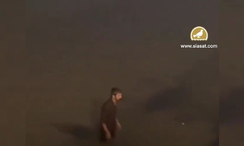 Watch: Thirsty alcoholic jumps into Hussain Sagar, demands 90 ml to come out