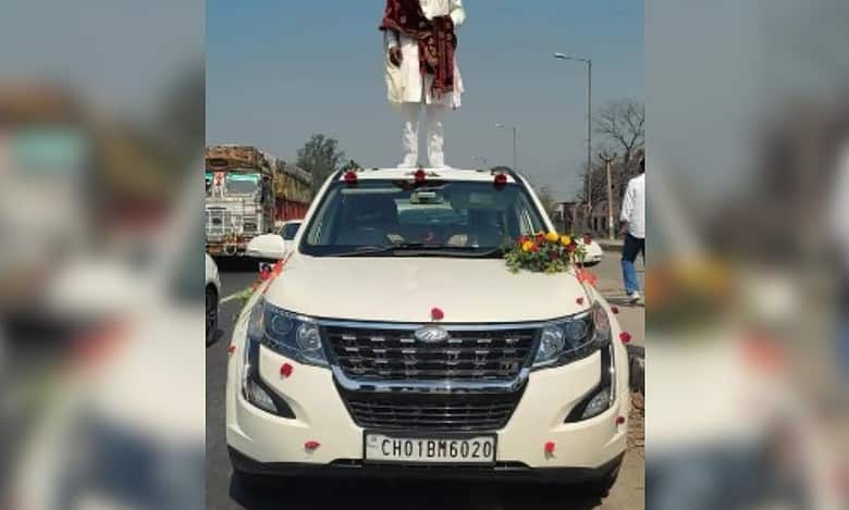 UP groom stands atop car, police seize vehicle