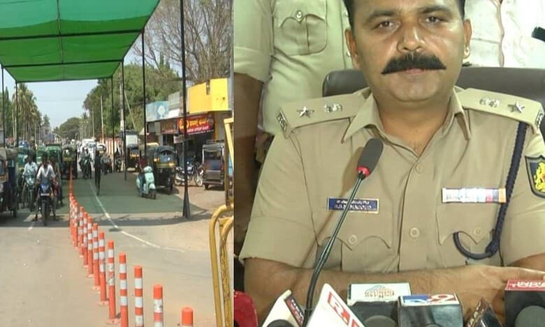 Karnataka: Gadag police arrange shade for two-wheeler riders at traffic signals