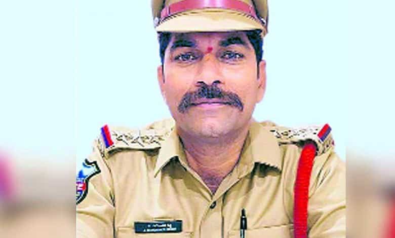 Mahender Reddy of the Mangalhat Police station
