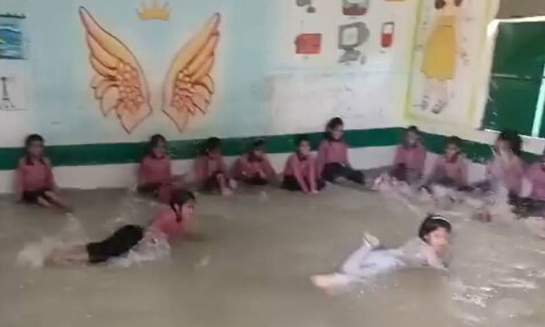Watch: Amid heatwave, classroom turned into swimming pool in UP
