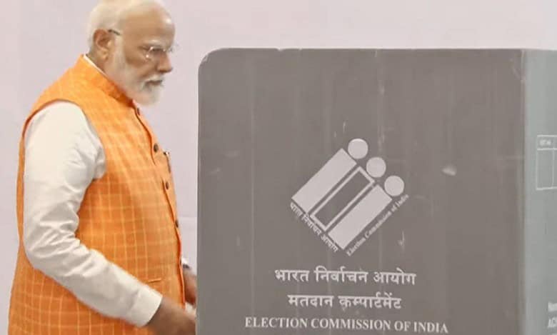 PM Modi votes at polling booth in Gandhinagar Lok Sabha constituency