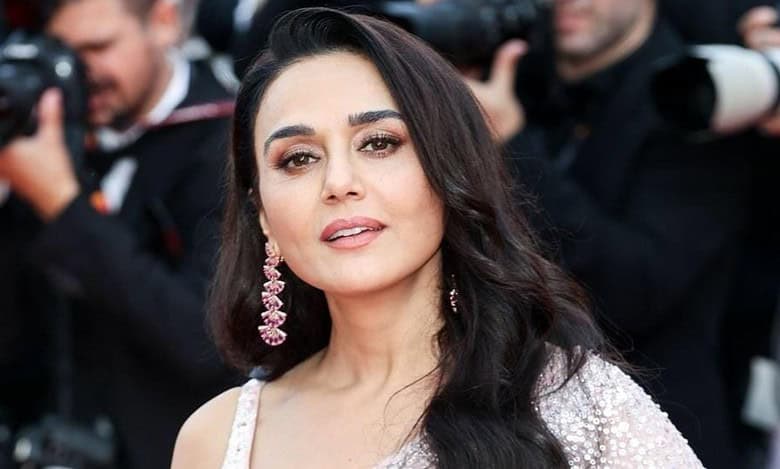 Preity Zinta adds desi touch to Cannes red carpet in pink saree