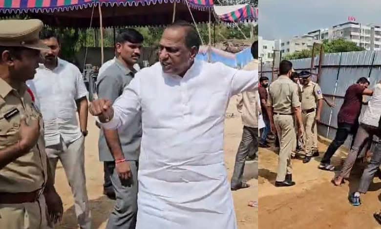 Ch Malla Reddy gets the boundary fence removed from the land with the help of his followers in the presence of police officers who were there to prevent the issue from escalating.