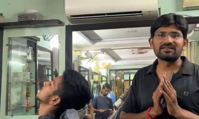 Malluvalasa Radhakrishna, the head of RK Smart the saloon in Visakhapatnam, announces free haircut for all those who cast their vote on May 13
