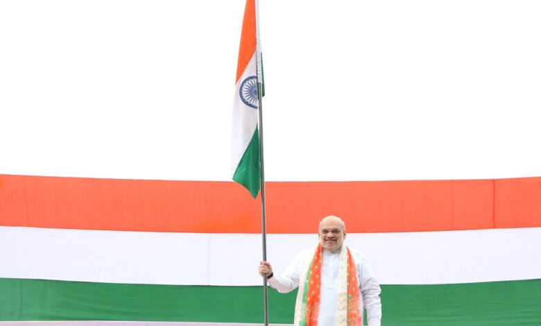 Amit Shah hoists tricolour atop residence