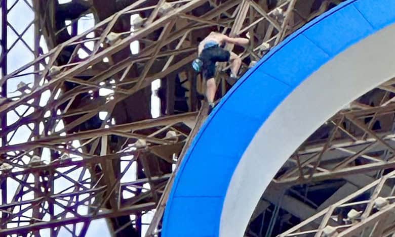 Man on eiffel tower