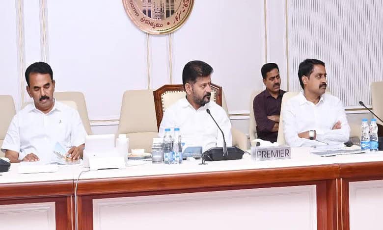 CM Revanth Reddy instructs officials to prepare proposals for constructing skywalk way around Hussainsagar lake.