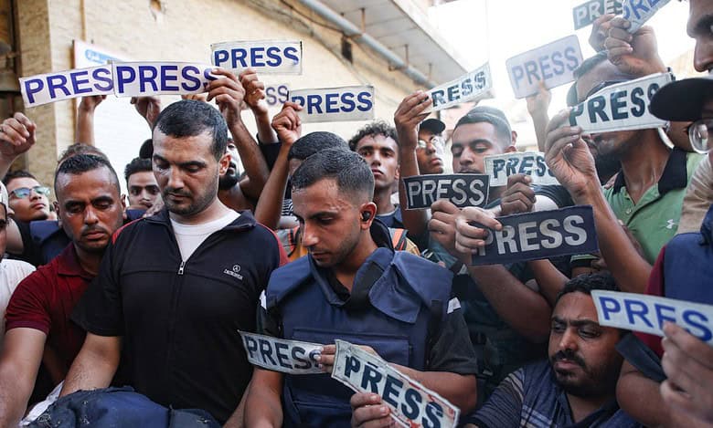 Watch: Gaza journalists protest recent killing of colleagues, remove press vests