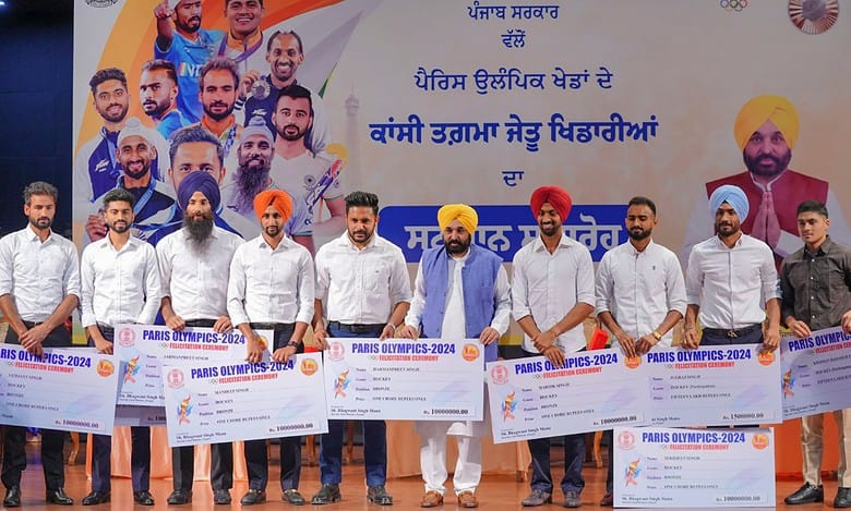 Punjab Chief Minister felicitated eight Olympic hockey players of the state with a cash prize of Rs 1 crore each