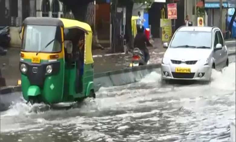 Waterlogging & traffic jams in Bengaluru following early morning showers
