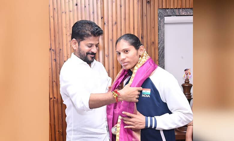 Telangana CM facilitaes athlete Deepti Jeevanji, gifts Rs 1 cr cash