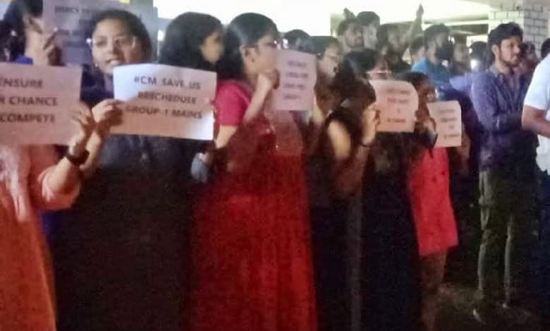 Group-I mains candidates detained for protesting in Ashok Nagar, demanding rescheduling of the exam.