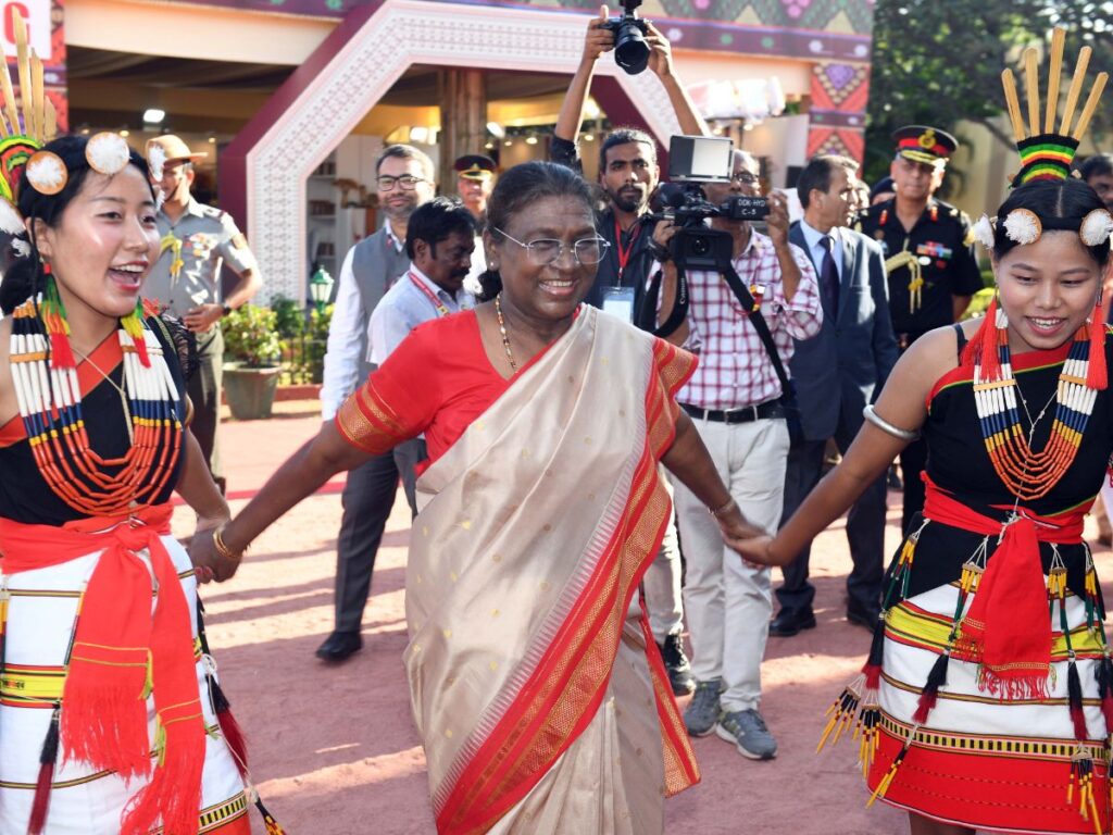 President Droupadi Murmu joining a ceremonial dance with participants from NorthEast India