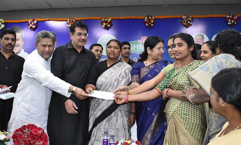 Musi rehabilitation: Seethakka hands over cheques worth Rs 3.44 cr to 17 SHGs