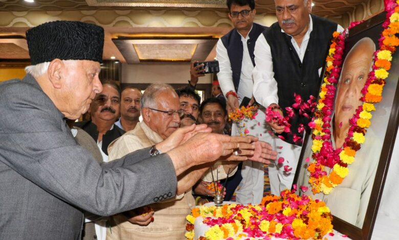 Jammu and Kashmir National Conference President Farooq Abdullah and state Congress Committee President Tariq Hameed Karra during a ceremony to pay tribute to former deputy chief minister Mangat Ram Sharma on his birth anniversary