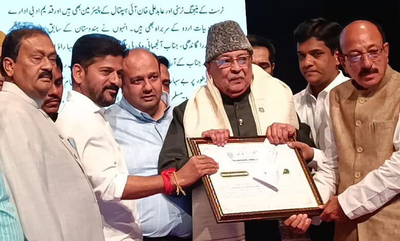 Revanth Reddy confers Maulana Azad Award to Zahid Ali Khan