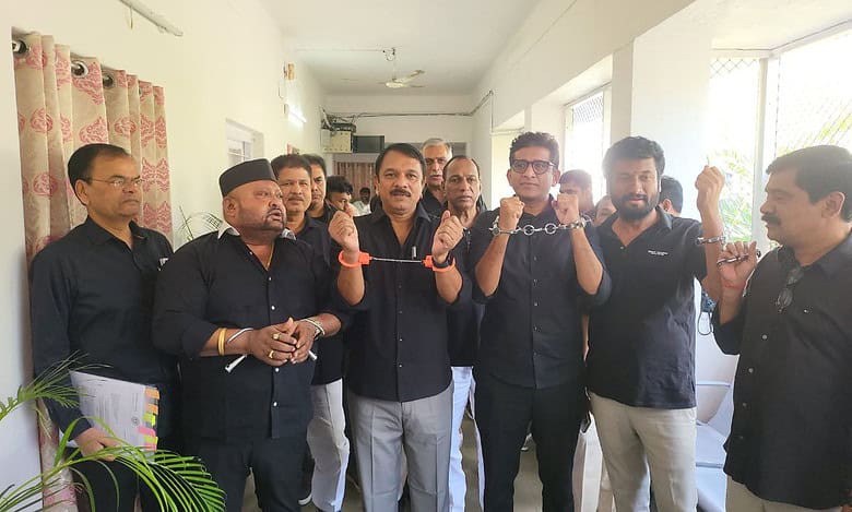 BRS MLAs protest with handcuffs against Lagcherla farmers' arrest