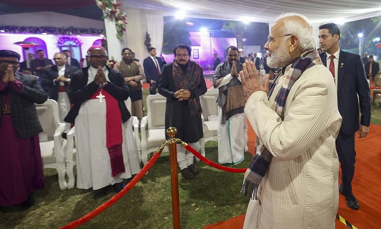 Prime Minister Narendra Modi during the Christmas celebrations at the residence of Union Minister George Kurian, in New Delhi.