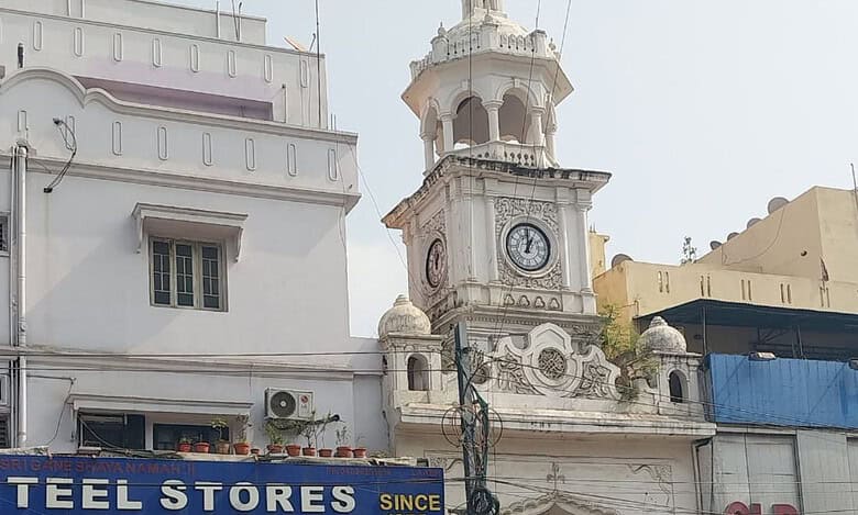 Vegetation growing on Raja Rai Raiyan clock tower in Hyderabad's Shahalibanda