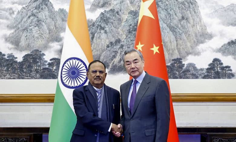 National Security Advisor Ajit Doval with Chinese Foreign Minister Wang Yi and other dignitaries during a meeting, in Beijing, China, Wednesday, Dec. 18, 2024. (PTI Photo)