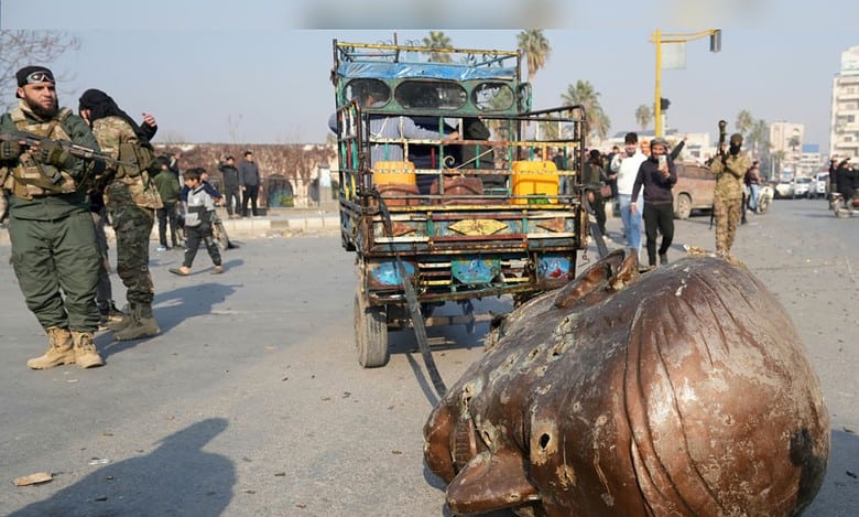 Syria: Rebels celebrate Hama takeover by toppling Hafez al-Assad’s statue