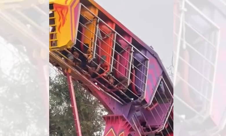 Amusement ride at Numaish in Hyderabad stuck upside down