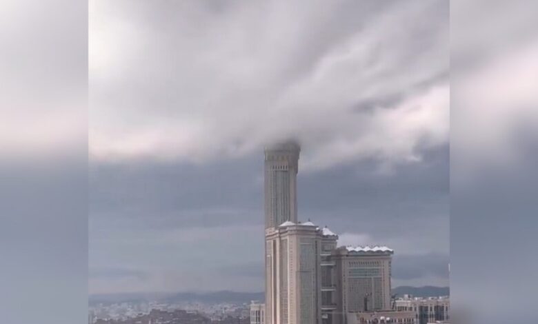 Watch: Dense clouds cover Makkah Clock Tower