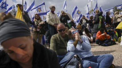 People gather at Hostage Square in Tel Aviv, Israel, Thursday, Feb. 20, 2025, as Hamas hand over four bodies to the Red Cross in Gaza (AP Photo/Oded Balilty)