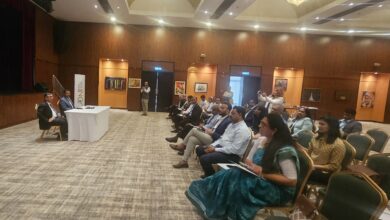 press release of journalists at the launch of new insurance plans for Indian workers in United Arab Emirates