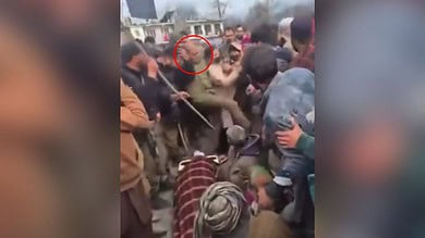 J&K cop kicks female protestor amid row over mysterious death Gujjar brothers