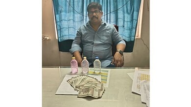 assistant engineer Surender Reddy caught taking bribe