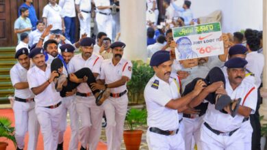 BJP MLAs being carried out by marshals