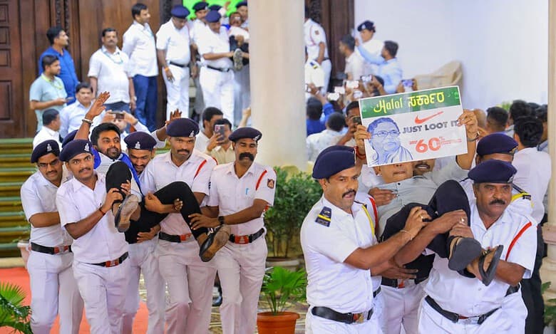 BJP MLAs being carried out by marshals
