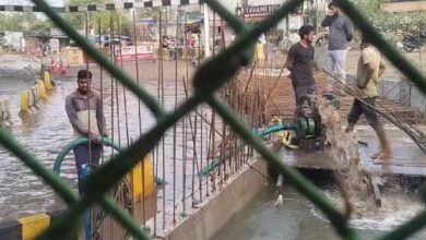 road under bridge kondapur water logging