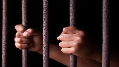 A Representational image of a person in jail