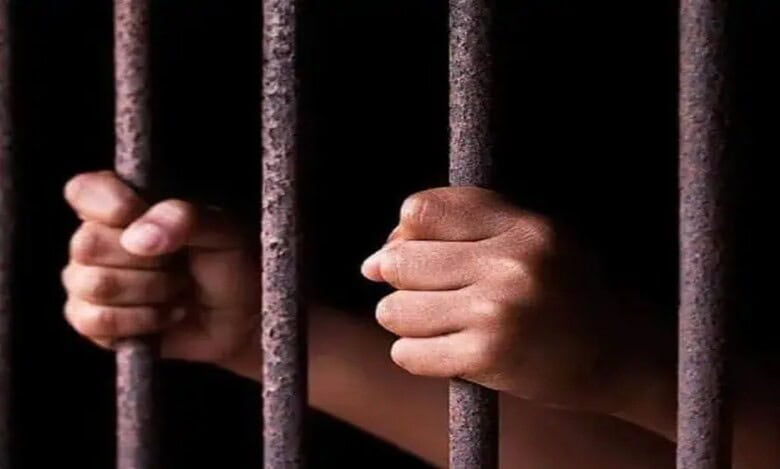 A Representational image of a person in jail