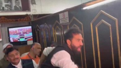 Scuffle between BJP members and AAP MLA Mehraj Malik in the Jammu and Kashmir Assembly premises.