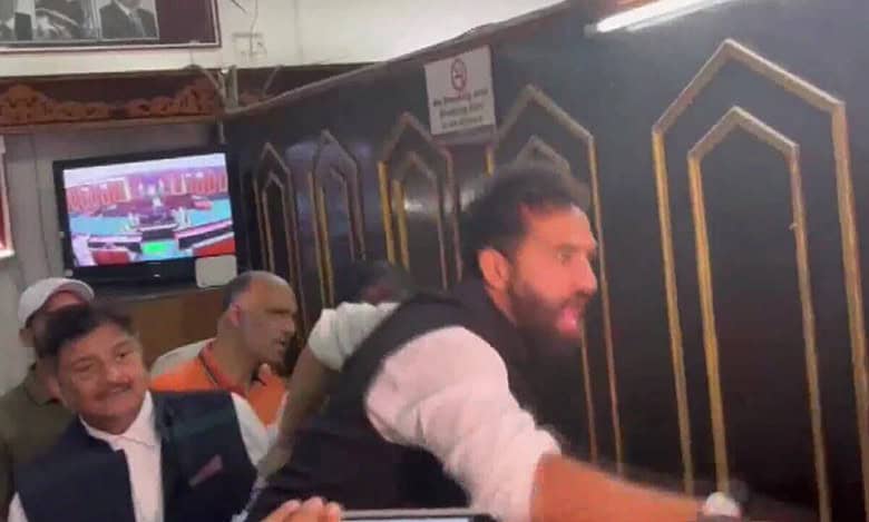 Scuffle between BJP members and AAP MLA Mehraj Malik in the Jammu and Kashmir Assembly premises.