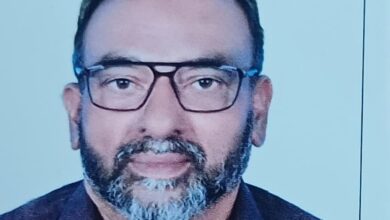 Photo of Samsudhin Hosdurg, Indian expat and Big Ticket Abu Dhabi winner, wearing glasses and a dark shirt.